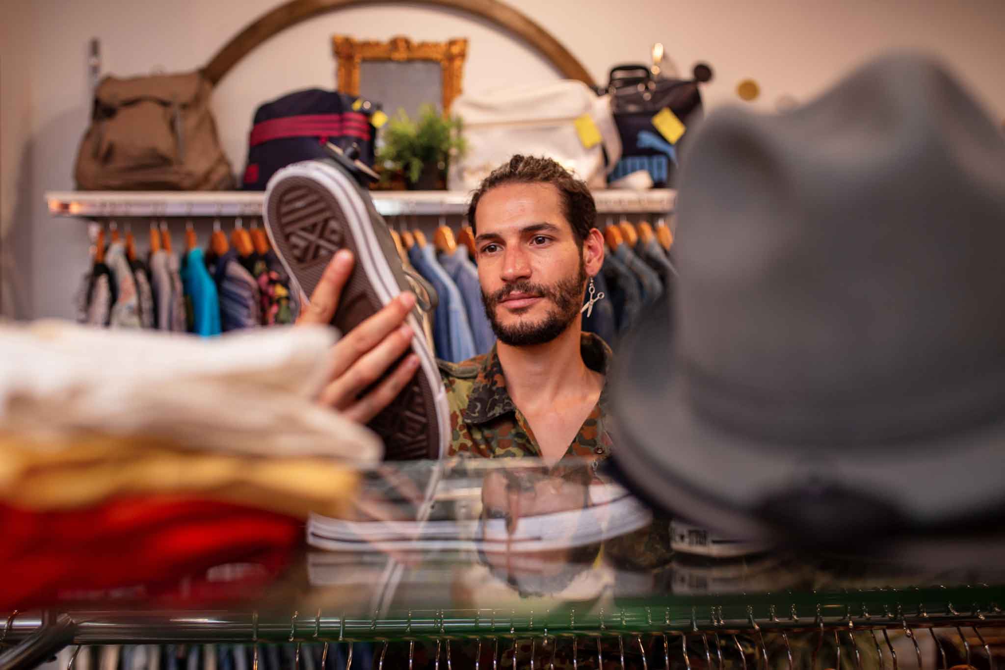 Inicio 2 cheerful man choosing shoes and accessories in sho 2025 04 03 03 55 37 utc